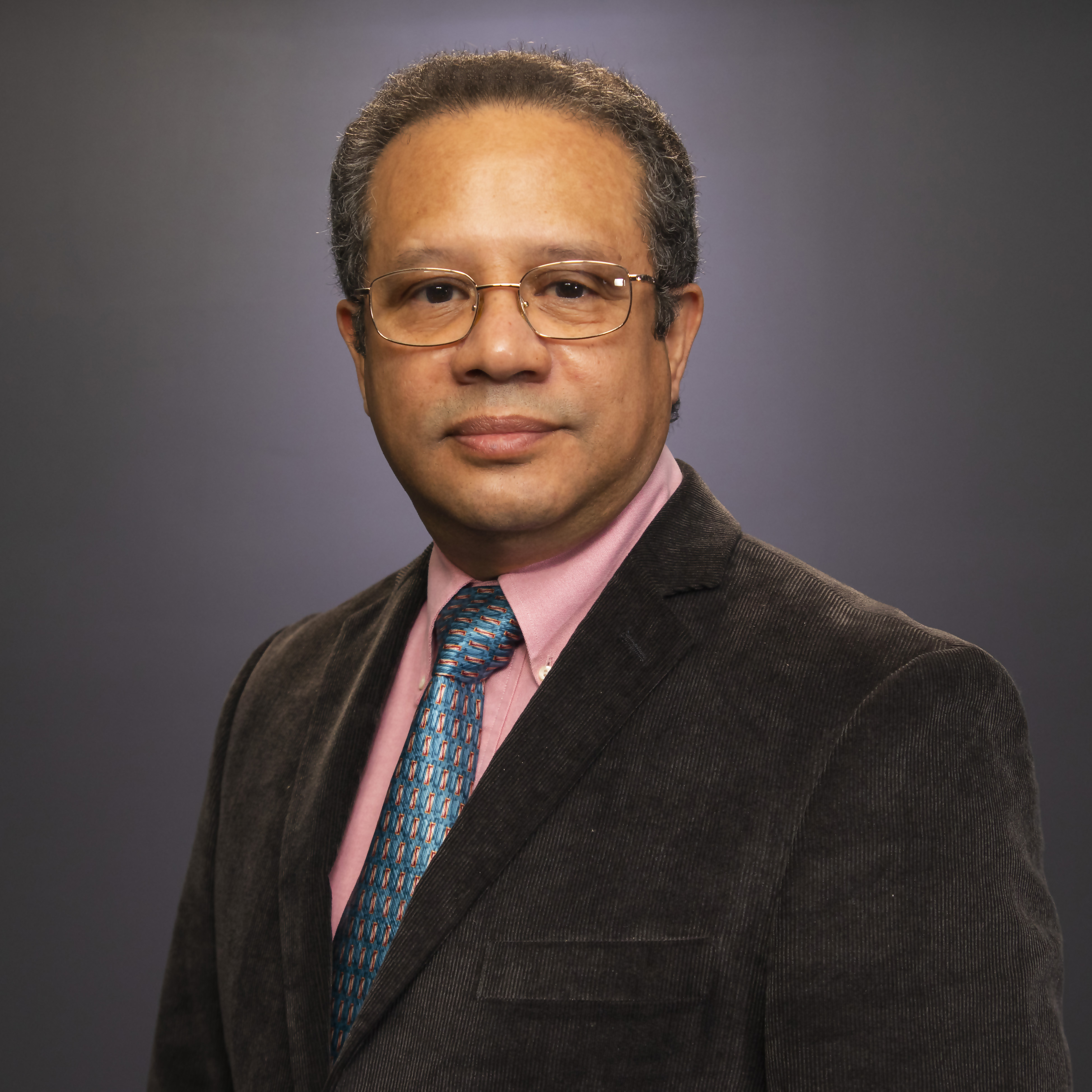 A professional headshot of Jose Silva-Lugo